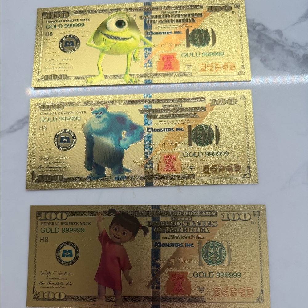 24 K Gold-Plated Monsters Inc dollars. Not real money. Collectors.